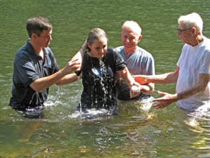 United Methodist baptism in the river