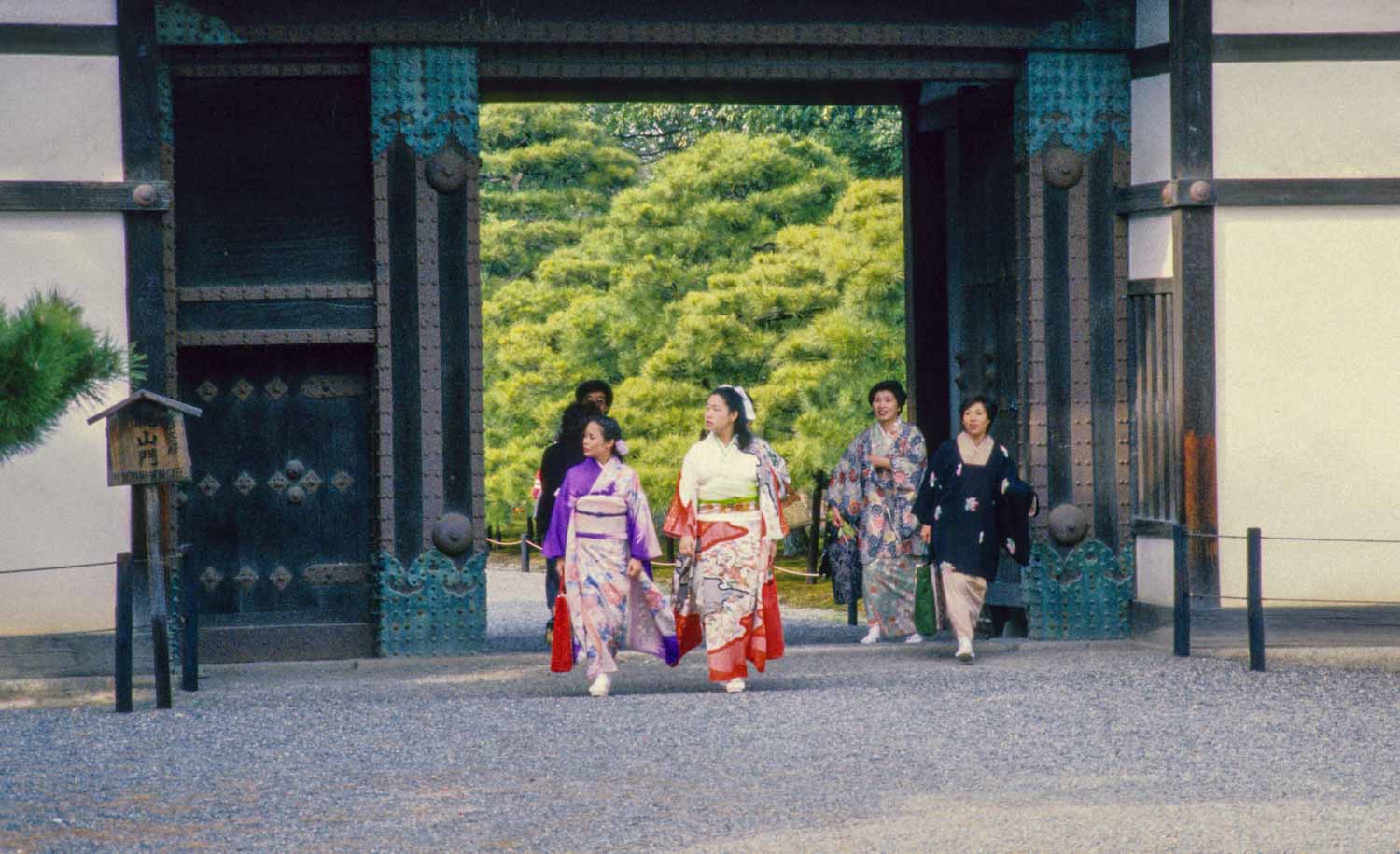 Women enter Imperial Palace grounds in Kyoto